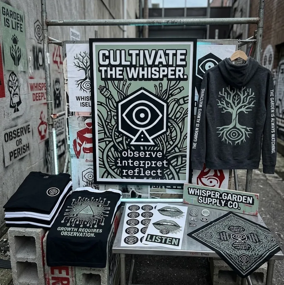 Merch de Whisper.Garden Supply Co. sobre un andamio: póster enmarcado Cultivate the Whisper, hoodie, camisetas, stickers y bandana